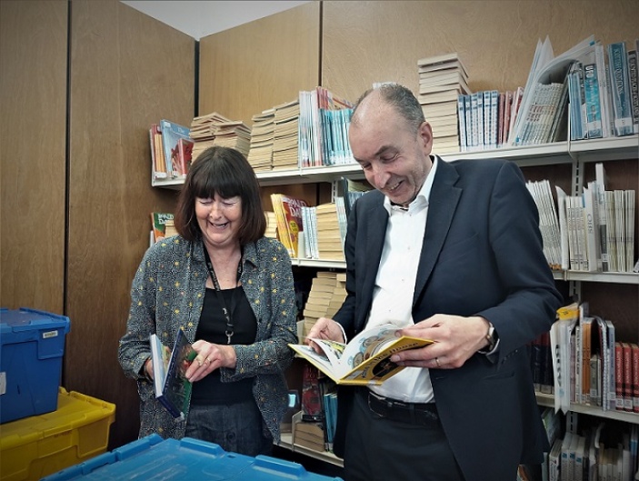 Bringing back memories. Principal Librarian Yvonne Manning and Chief Executive Kenneth Lawrie read books written in Scots. For Kenneth, ‘A moose in the hoose’ was a short story he often read to his daughters whin they wur wee. 