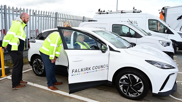 Council Leader, Cllr Cecil Meiklejohn hears about the benefits of the green fleet