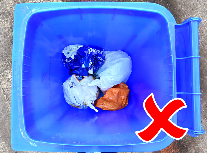 Contaminated blue bin