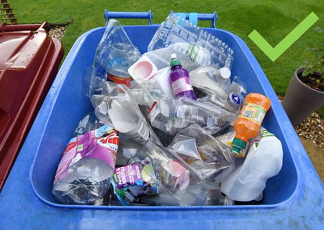 Example of a blue bin with clean, dry and loose plastics, cans and cartons